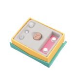 AXON K-86 hearing aid complete package including the sound amplifier device, multiple ear tips, and batteries