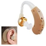 Axon X-168 hearing aid worn behind the ear showing transparent tube and comfortable fit.