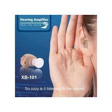 Model XB-101 Hearing Amplifier being worn comfortably near the ear, promoting a cozy listening experience.