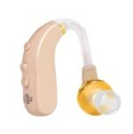 Light brown behind-the-ear hearing aid device with ON button for elderly in Karachi